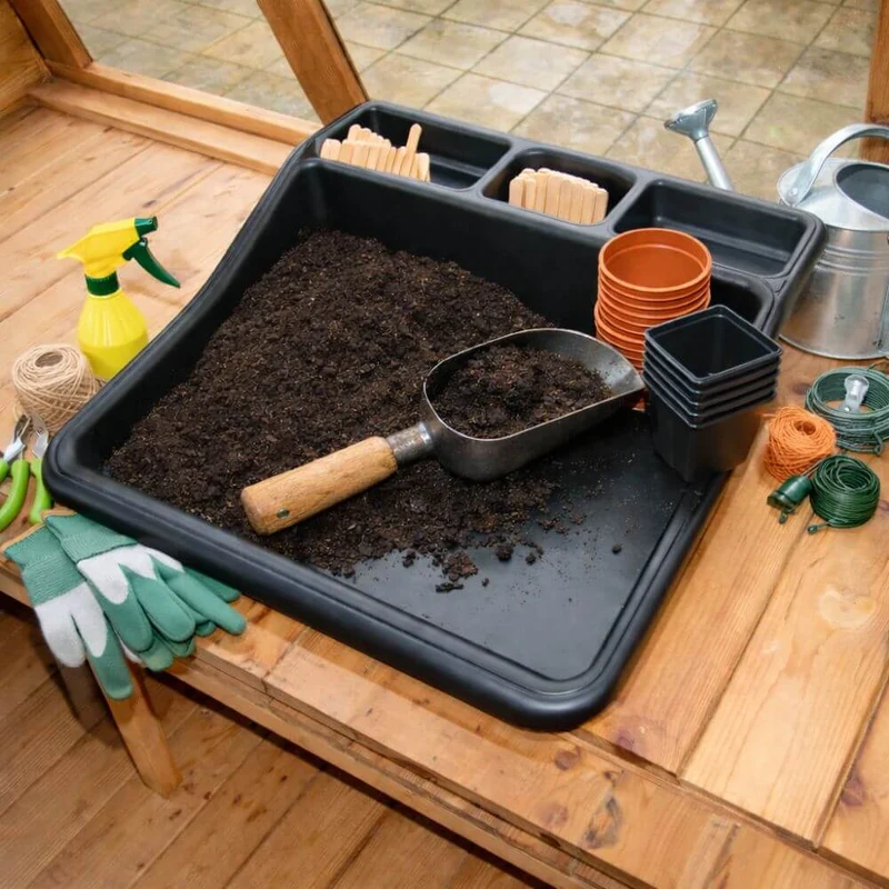 Black potting tray for gardening seed planting and repotting